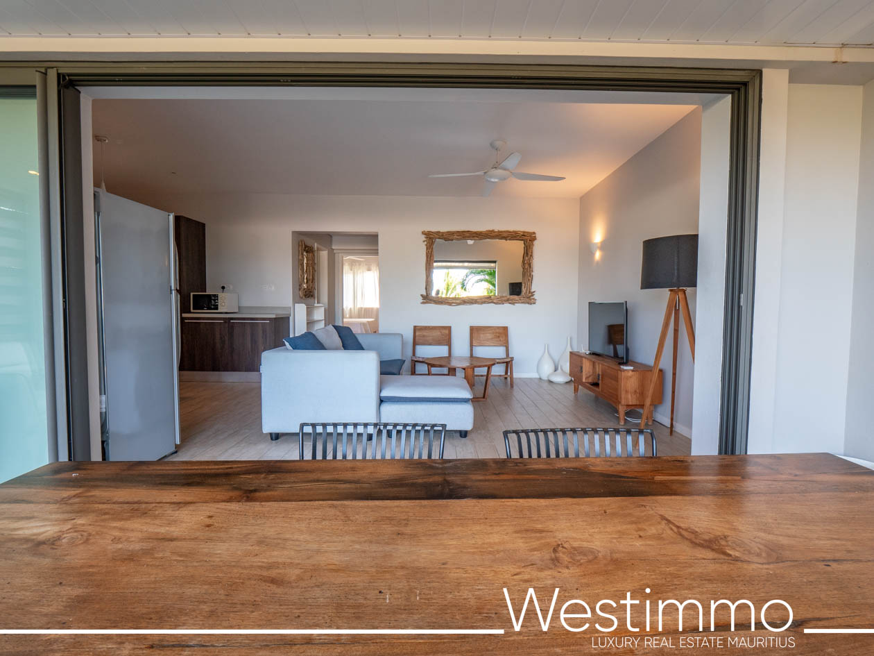 Image showing the charm of an exclusive 84 m2 apartment with a delightful 15 m2 private garden, located on the first floor of a secure residence offering an ideal and serene lifestyle Westimmo real estate agency