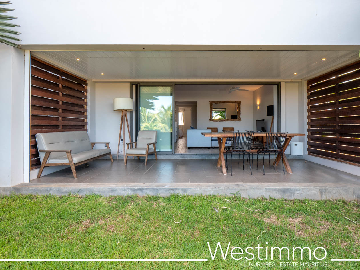 Image showing the charm of an exclusive 84 m2 apartment with a delightful 15 m2 private garden, located on the first floor of a secure residence offering an ideal and serene lifestyle Westimmo real estate agency