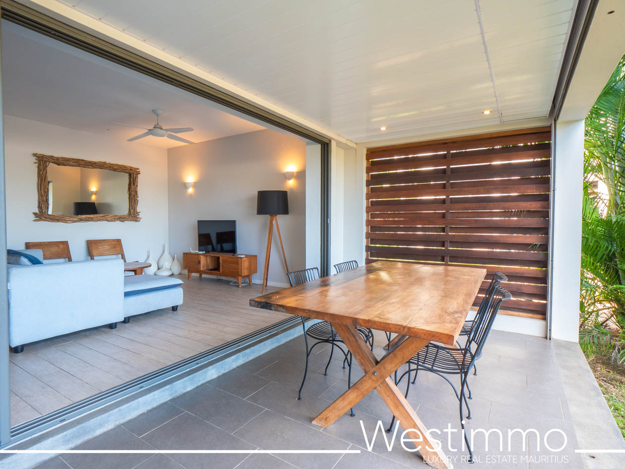 Image showing the charm of an exclusive 84 m2 apartment with a delightful 15 m2 private garden, located on the first floor of a secure residence offering an ideal and serene lifestyle
Westimmo real estate agency