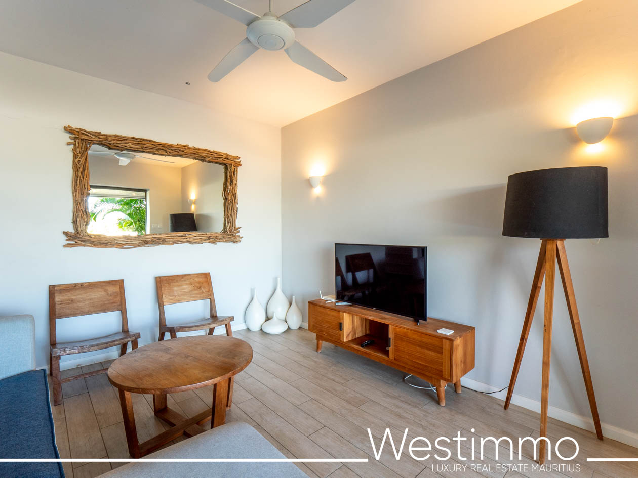 Image représentant le charme d'un appartement exclusif de 84 m2 avec un ravissant jardin privatif de 15 m2, situé au rez-de-chaussée d'une résidence sécurisée offrant une vie idéale et sereine Westimmo agence immobilière