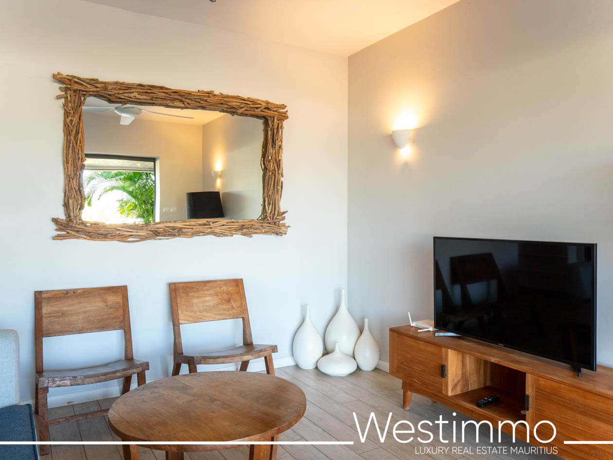 Image showing the charm of an exclusive 84 m2 apartment with a delightful 15 m2 private garden, located on the first floor of a secure residence offering an ideal and serene lifestyle Westimmo real estate agency