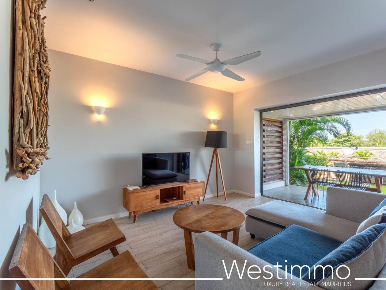 Image showing the charm of an exclusive 84 m2 apartment with a delightful 15 m2 private garden, located on the first floor of a secure residence offering an ideal and serene lifestyle Westimmo real estate agency