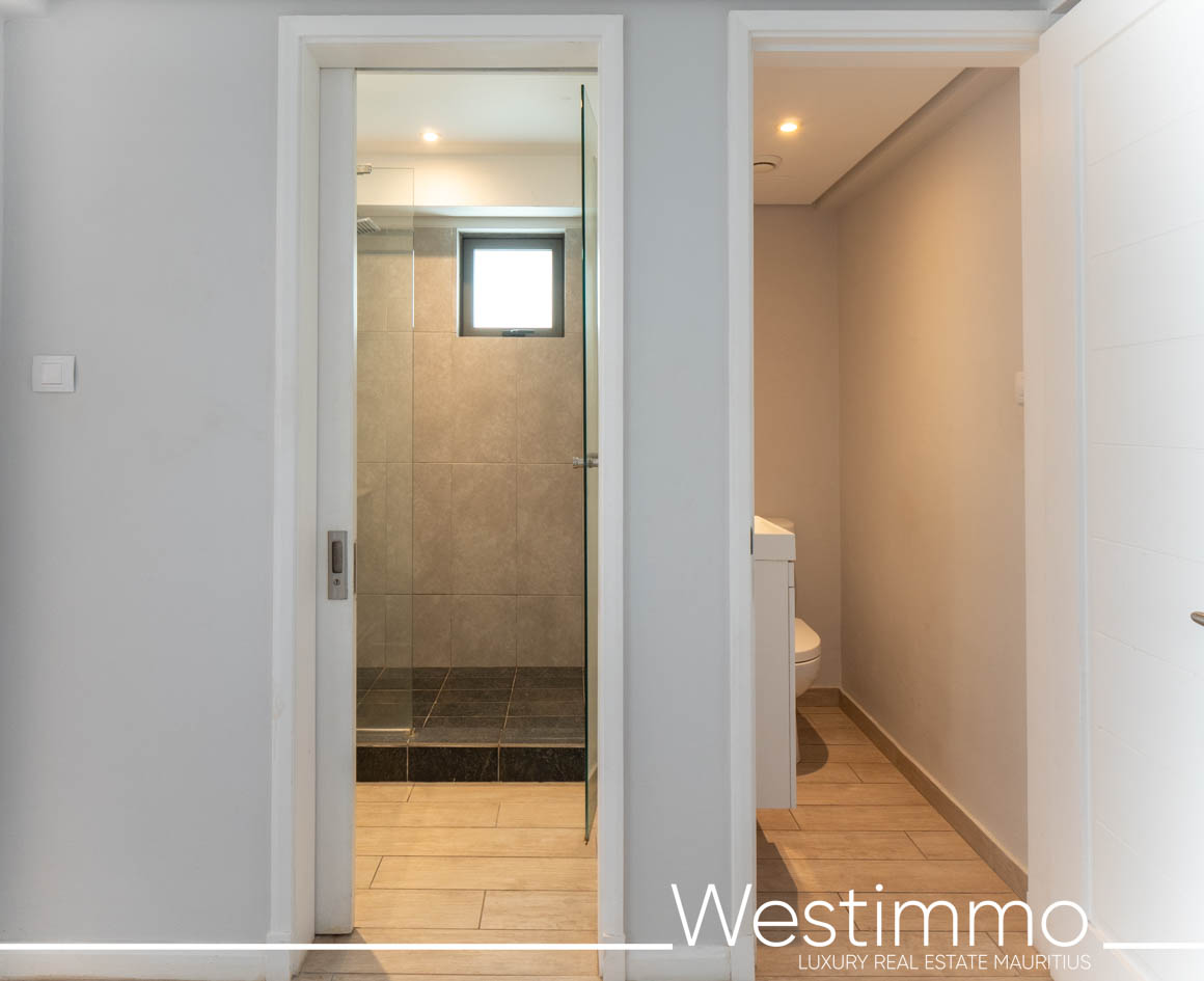 Image showing the charm of an exclusive 84 m2 apartment with a delightful 15 m2 private garden, located on the first floor of a secure residence offering an ideal and serene lifestyle Westimmo real estate agency