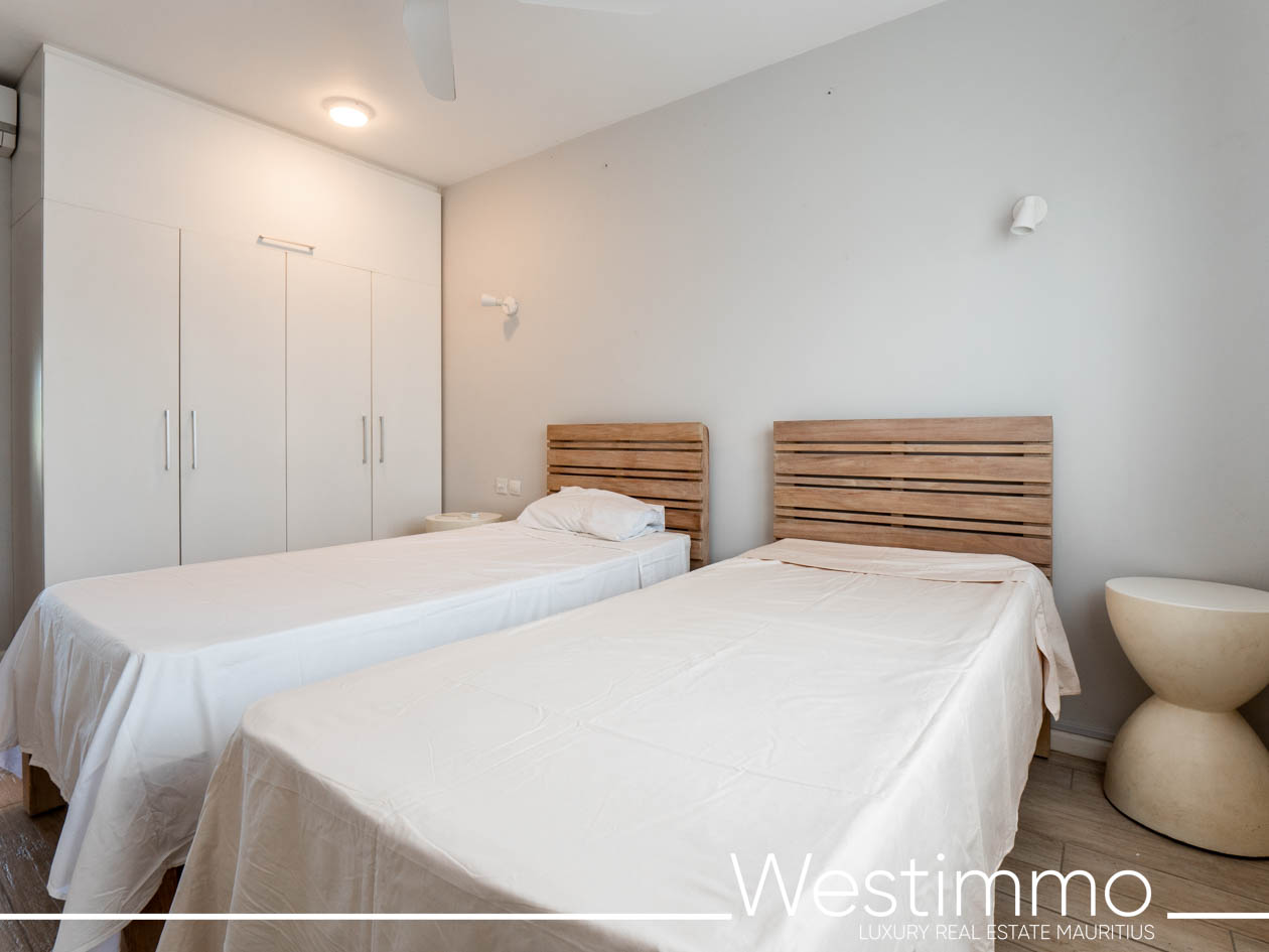 Image représentant le charme d'un appartement exclusif de 84 m2 avec un ravissant jardin privatif de 15 m2, situé au rez-de-chaussée d'une résidence sécurisée offrant une vie idéale et sereine Westimmo agence immobilière