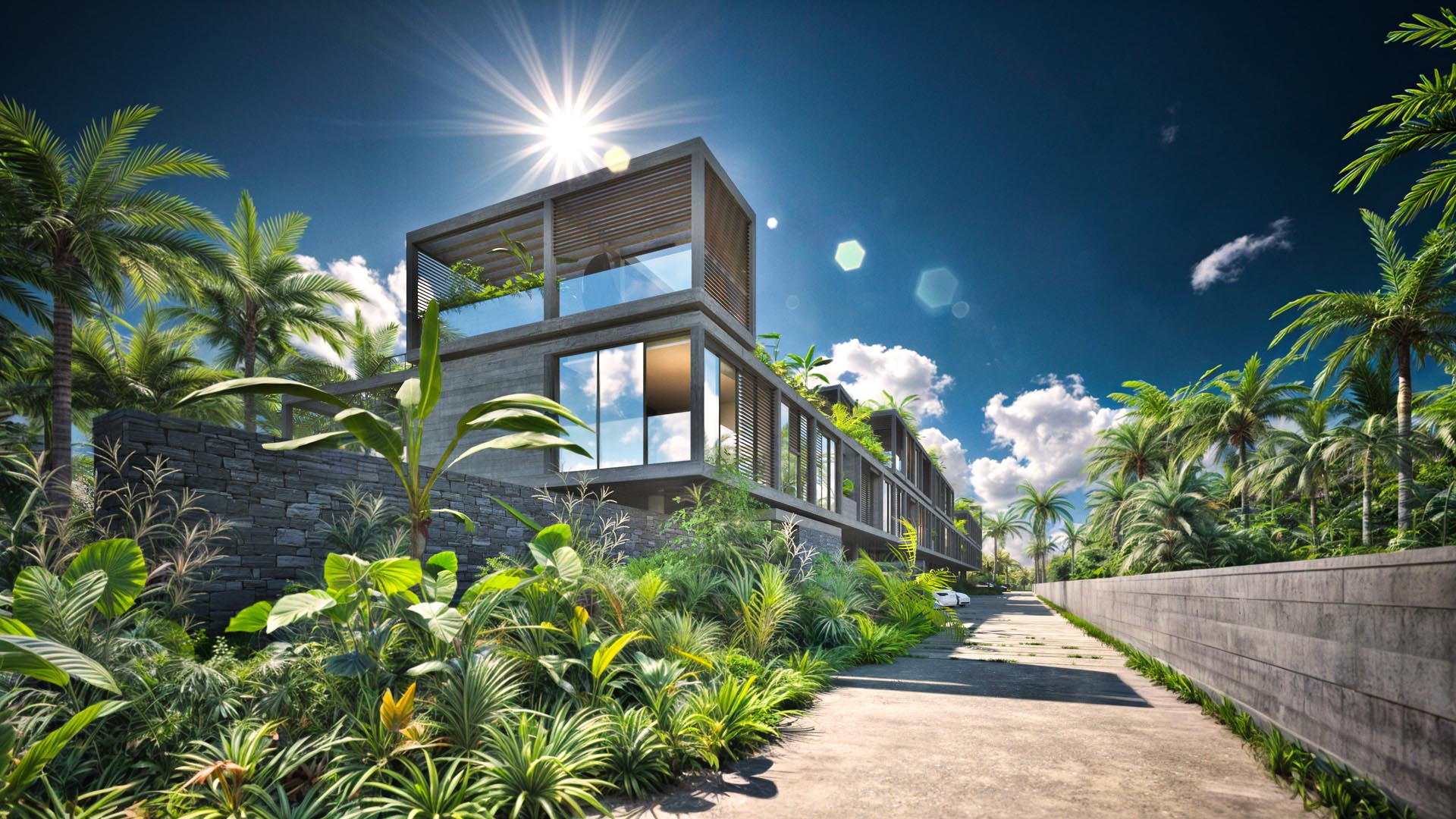 Entrée privée de la résidence – Crystal Cove by Westimmo Accès principal à Crystal Cove à Roches Noires, entre murs en pierre et végétation tropicale