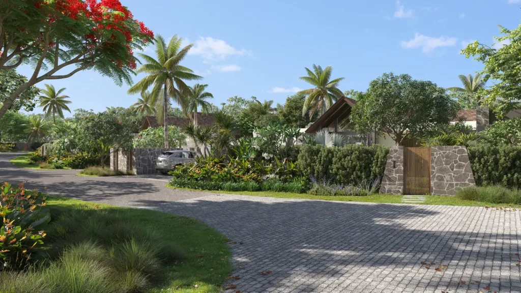 Rue résidentielle bordée de murs en pierre et de villas, Anahita Beau Champ, île Maurice